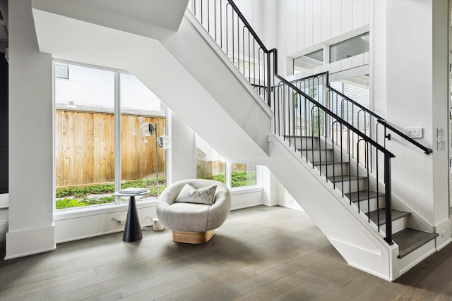 1220 Bomar St, Houston, TX 77006 - staircase featuring hardwood / wood-style floors