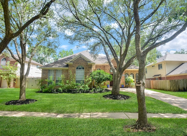 4415 Crimson Ct, Sugar Land, TX 77479 - view of front of property with brick siding and a shingled roof