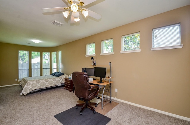 4415 Crimson Ct, Sugar Land, TX 77479 - bedroom featuring multiple windows, carpet flooring, a desk, and a ceiling fan