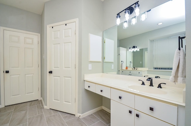 4415 Crimson Ct, Sugar Land, TX 77479 - bathroom with vanity and baseboards