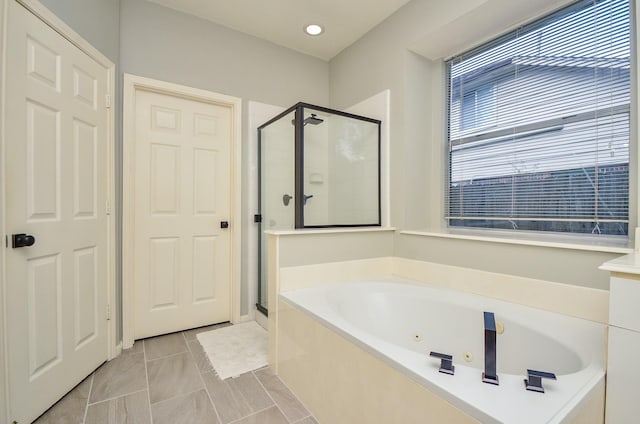 4415 Crimson Ct, Sugar Land, TX 77479 - full bath with a stall shower, a whirlpool tub, and recessed lighting