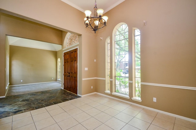 4415 Crimson Ct, Sugar Land, TX 77479 - tiled entryway with plenty of natural light, a chandelier, ornamental molding, arched walkways, and carpet flooring