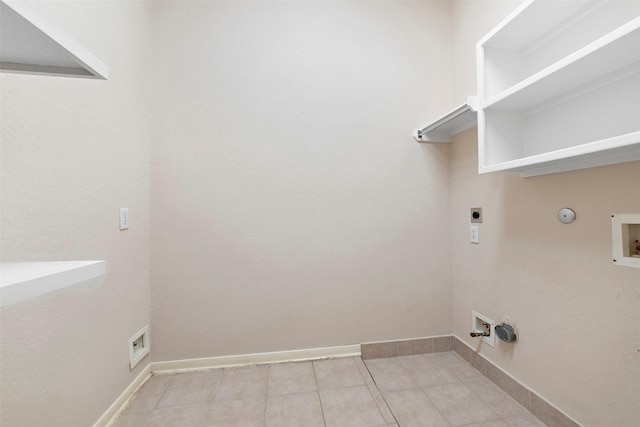 3318 Misty Alcove Ct, Kingwood, TX 77345 - laundry room featuring gas dryer hookup, hookup for an electric dryer, washer hookup, and light tile patterned floors