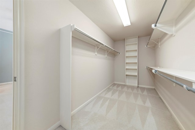 3318 Misty Alcove Ct, Kingwood, TX 77345 - spacious closet featuring light colored carpet