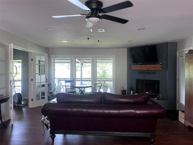 230 W Lake Dr, Livingston, TX 77351 - living area with ceiling fan, wood finished floors, a brick fireplace, and recessed lighting