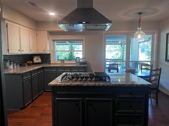 230 W Lake Dr, Livingston, TX 77351 - kitchen featuring island range hood, gas stovetop, dark wood-type flooring, backsplash, and recessed lighting