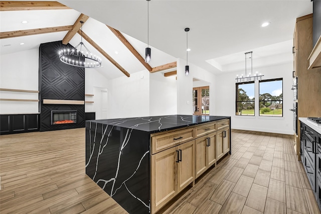 200 Rd 6615, Dayton, TX 77535 - kitchen featuring a chandelier, open floor plan, light wood finished floors, a large fireplace, and recessed lighting