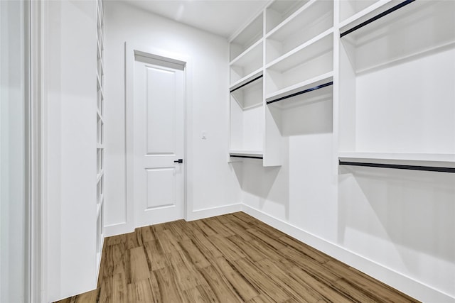 200 Rd 6615, Dayton, TX 77535 - spacious closet with wood finished floors