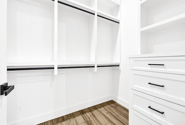 200 Rd 6615, Dayton, TX 77535 - walk in closet featuring wood finished floors
