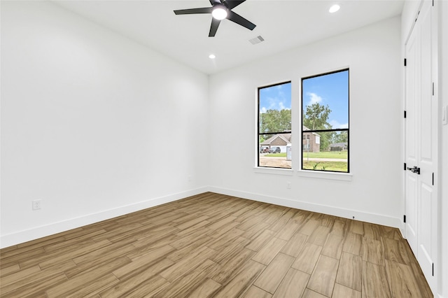 200 Rd 6615, Dayton, TX 77535 - empty room featuring ceiling fan, light wood-type flooring, and recessed lighting