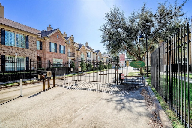 974 Memorial Village Dr Unit 53, Houston, TX 77024 - gate with a residential view