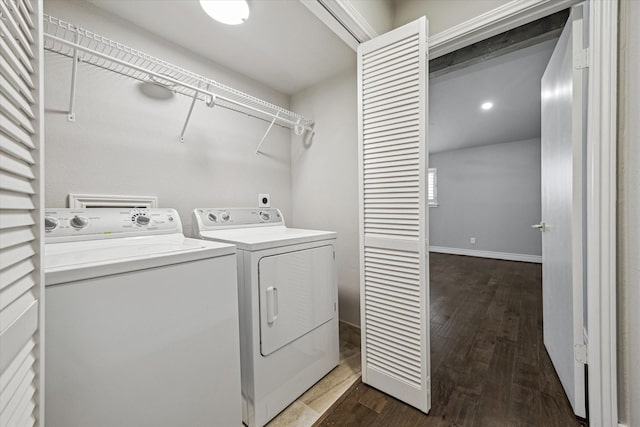 974 Memorial Village Dr Unit 53, Houston, TX 77024 - laundry area featuring washing machine and clothes dryer and dark wood-type flooring