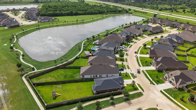 19838 Blue Roan Dr, Tomball, TX 77377 - aerial view of residential area with a nearby body of water