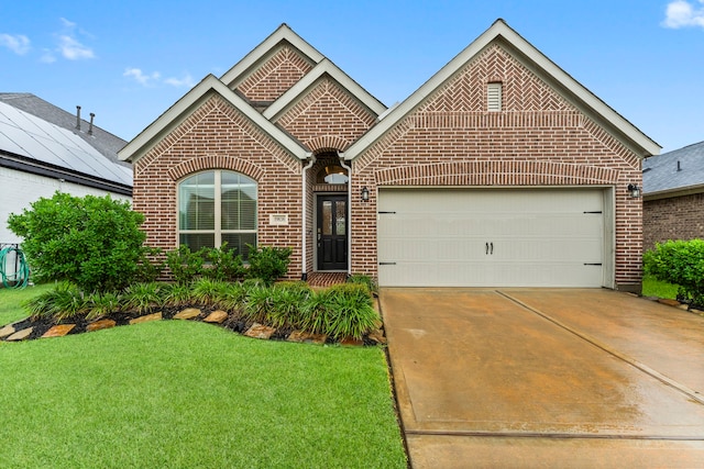 19838 Blue Roan Dr, Tomball, TX 77377 - single story home with brick siding, a garage, a front yard, and concrete driveway