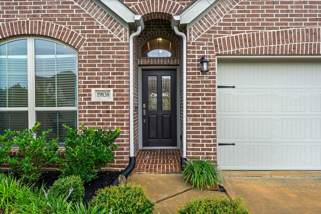 19838 Blue Roan Dr, Tomball, TX 77377 - entrance to property with brick siding and a garage