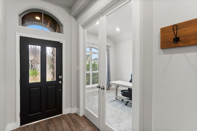 19838 Blue Roan Dr, Tomball, TX 77377 - foyer entrance featuring dark wood finished floors, recessed lighting, french doors, and lofted ceiling