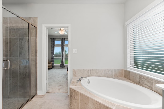 19838 Blue Roan Dr, Tomball, TX 77377 - full bath with a garden tub, a stall shower, and ceiling fan