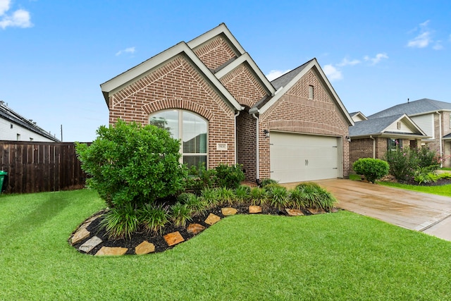 19838 Blue Roan Dr, Tomball, TX 77377 - view of front of property featuring brick siding, an attached garage, and driveway