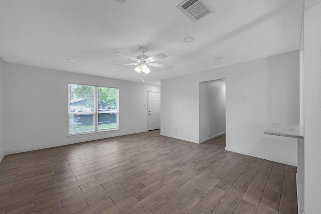 4707 Dove Springs Dr, Austin, TX 78744 - empty room with ceiling fan and wood finished floors