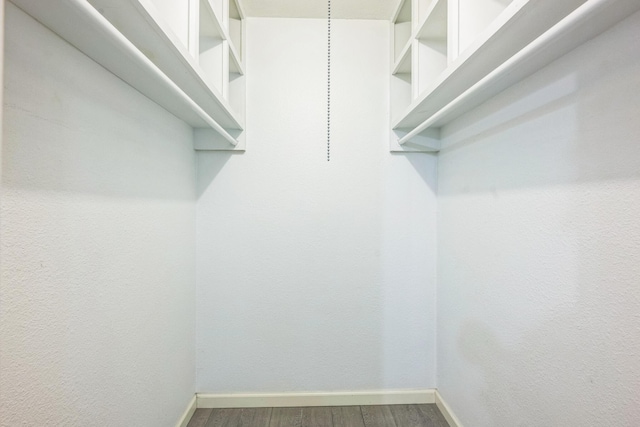 4707 Dove Springs Dr, Austin, TX 78744 - spacious closet with wood finished floors