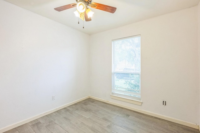 4707 Dove Springs Dr, Austin, TX 78744 - unfurnished room featuring light wood-type flooring and a ceiling fan