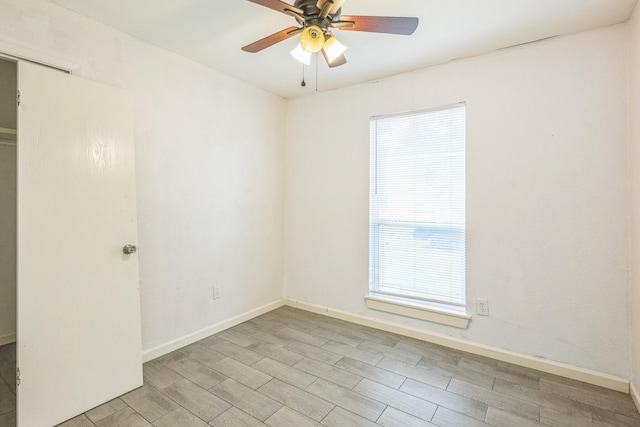 4707 Dove Springs Dr, Austin, TX 78744 - spare room with ceiling fan and light wood-type flooring