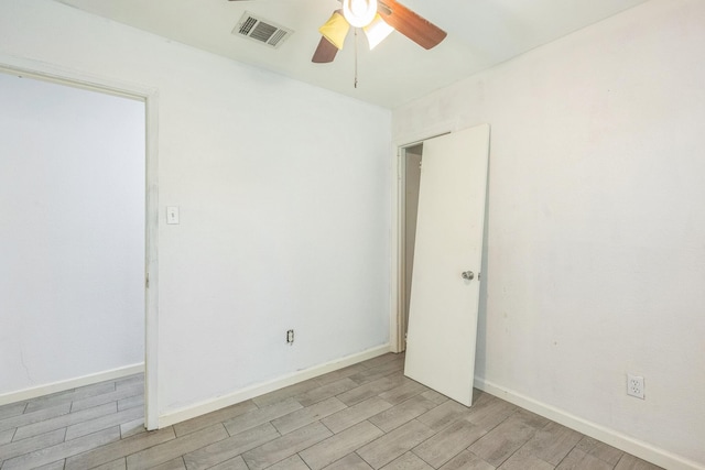 4707 Dove Springs Dr, Austin, TX 78744 - empty room with a ceiling fan and light wood finished floors