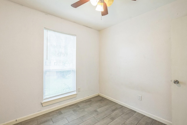 4707 Dove Springs Dr, Austin, TX 78744 - empty room featuring ceiling fan and light wood-type flooring