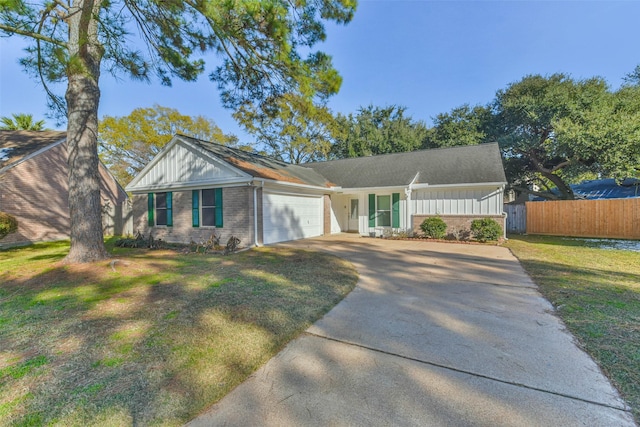 16002 Maple Acres Ct, Houston, TX 77095 - view of front of house with driveway, board and batten siding, brick siding, and a garage
