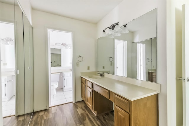 16002 Maple Acres Ct, Houston, TX 77095 - full bath featuring vanity and wood finished floors