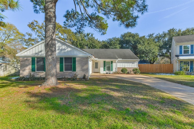 16002 Maple Acres Ct, Houston, TX 77095 - view of front of home featuring board and batten siding, brick siding, and driveway