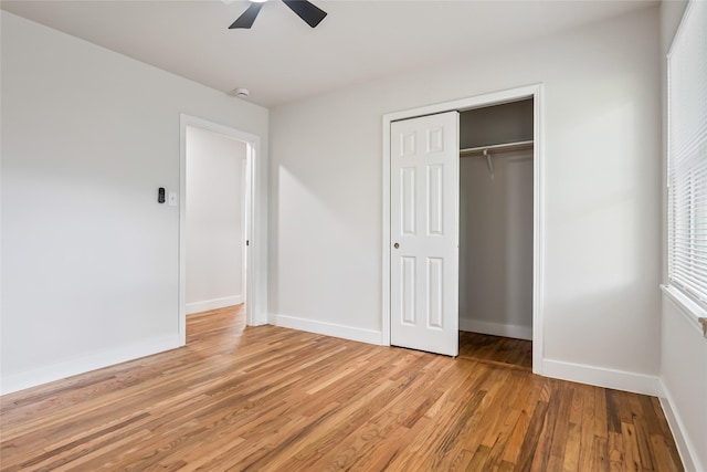 153 E Rittenhouse St, Houston, TX 77076 - unfurnished bedroom with light wood-style floors, a closet, and a ceiling fan