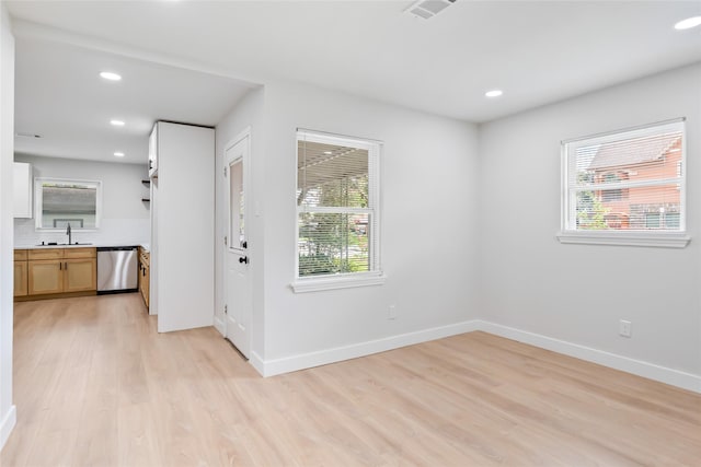153 E Rittenhouse St, Houston, TX 77076 - unfurnished room with healthy amount of natural light, light wood finished floors, and recessed lighting