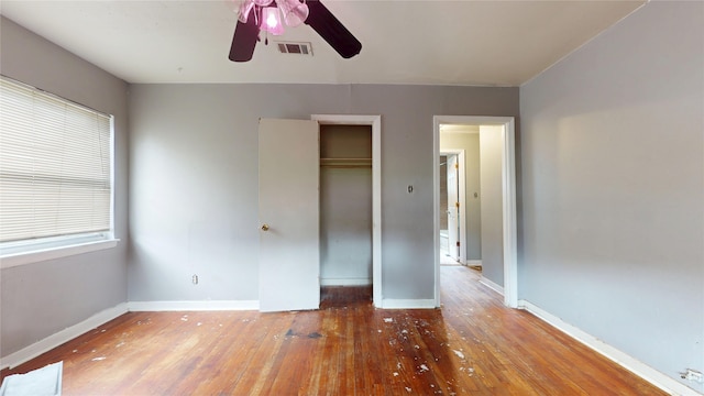 907 Axilda St, Houston, TX 77017 - unfurnished bedroom with wood-type flooring, a closet, and a ceiling fan