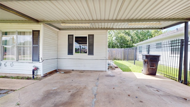 907 Axilda St, Houston, TX 77017 - fenced backyard featuring a carport and a patio area