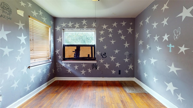 907 Axilda St, Houston, TX 77017 - unfurnished room with wood-type flooring and wallpapered walls