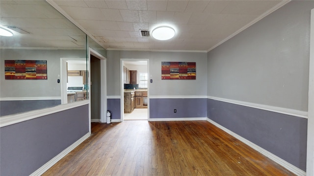 907 Axilda St, Houston, TX 77017 - unfurnished room featuring hardwood / wood-style flooring and crown molding