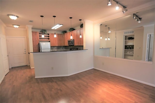 1711 Old Spanish Trl Unit 310, Houston, TX 77054 - kitchen featuring stainless steel microwave, freestanding refrigerator, open shelves, dark countertops, and track lighting