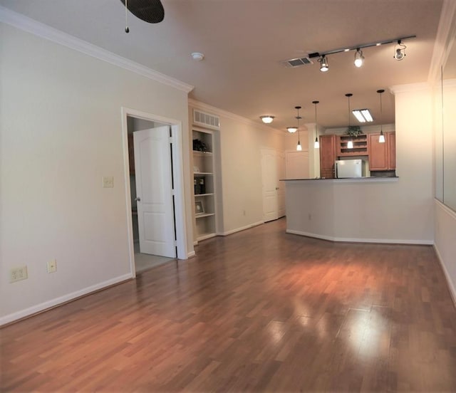 1711 Old Spanish Trl Unit 310, Houston, TX 77054 - unfurnished living room featuring ornamental molding, dark wood finished floors, ceiling fan, and built in shelves