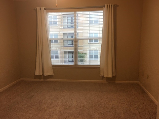 1711 Old Spanish Trl Unit 310, Houston, TX 77054 - unfurnished room featuring carpet floors and baseboards