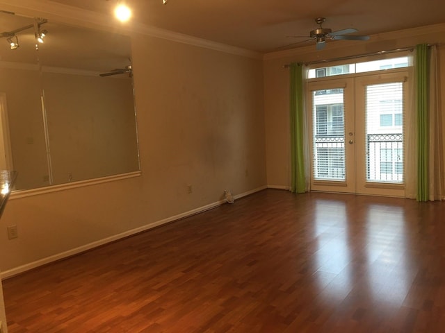 1711 Old Spanish Trl Unit 310, Houston, TX 77054 - empty room with a ceiling fan, crown molding, french doors, and wood finished floors