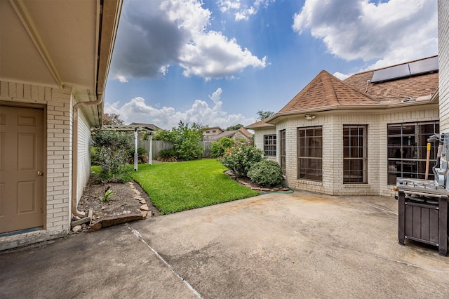 4417 Alamance St, Baytown, TX 77521 - fenced backyard with a patio