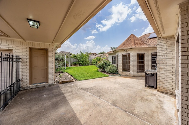 4417 Alamance St, Baytown, TX 77521 - fenced backyard featuring a patio