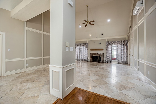 4417 Alamance St, Baytown, TX 77521 - unfurnished living room with high vaulted ceiling, a ceiling fan, a fireplace, a wall mounted air conditioner, and recessed lighting