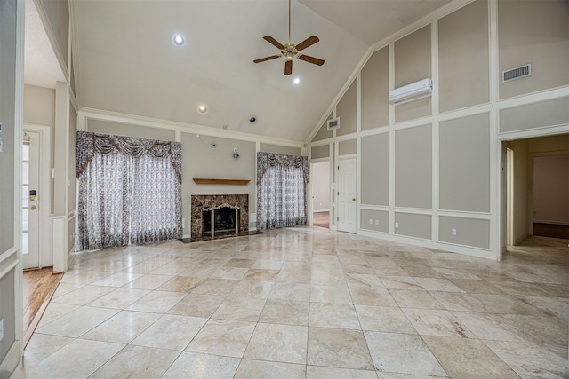 4417 Alamance St, Baytown, TX 77521 - unfurnished living room with a decorative wall, high vaulted ceiling, ceiling fan, a fireplace, and recessed lighting