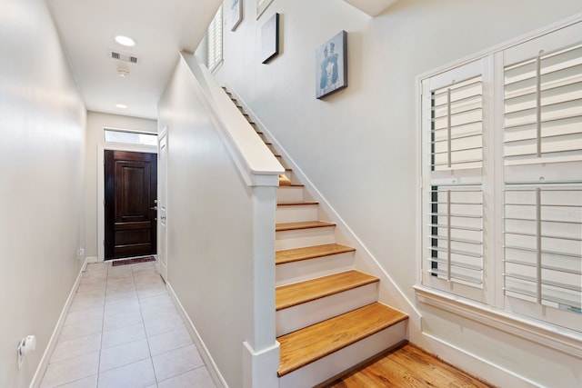 3908 Center St, Houston, TX 77007 - stairs with tile patterned flooring and recessed lighting