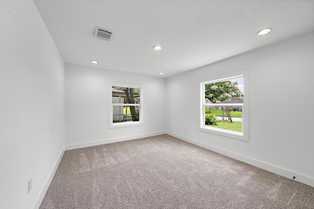 7711 Greenstone St, Houston, TX 77087 - spare room featuring carpet and recessed lighting