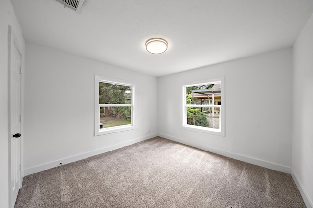 7711 Greenstone St, Houston, TX 77087 - carpeted spare room featuring baseboards