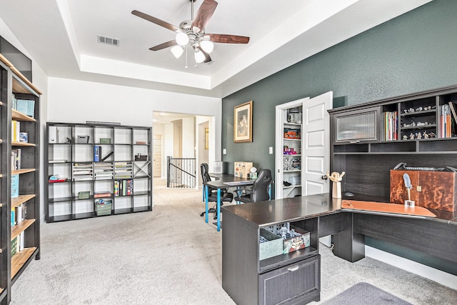 3119 Honeysuckle Way, Katy, TX 77493 - home office with carpet floors, a ceiling fan, and a raised ceiling