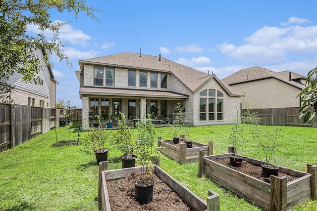 3119 Honeysuckle Way, Katy, TX 77493 - rear view of property with a vegetable garden, a fenced backyard, and a shingled roof